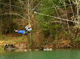 Zip Line Carries Boy over Water